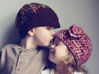 Cute babies kissing